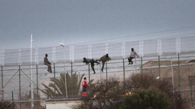 Migrants Storm across Morocco-Spain Border Fence